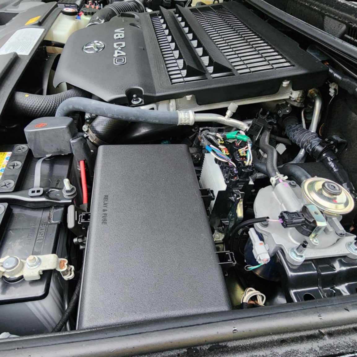 Engine bay of a Toyota V8 D-4D with the relay and fuse box in view